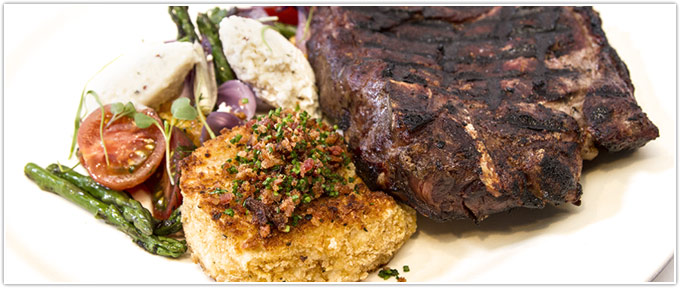 Charred Cowboy Cut Ribeye With Fully Loaded Baked Potato Croquettes