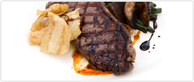 Grilled New York Strip With Charred Tomato Reduction