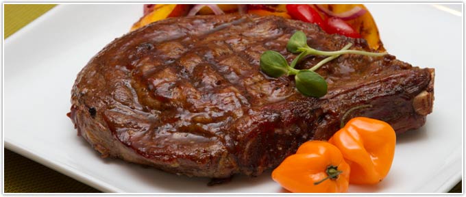 Grilled Ribeye With Peach Habañero Barbecue Sauce