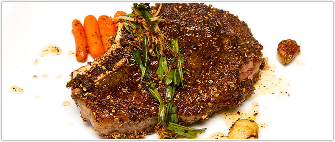 Spice-Crusted Cowboy Ribeye With Chili-Orange Glazed Carrots