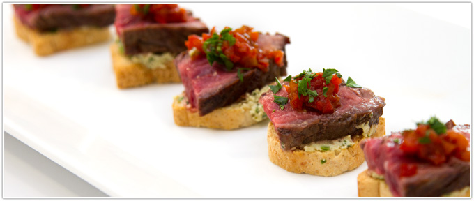 Steak Crostini With Vinegar Peppers & Pesto Cheese