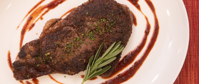 Tuscan-Spiced Ribeye With Red Wine Tomato Sauce